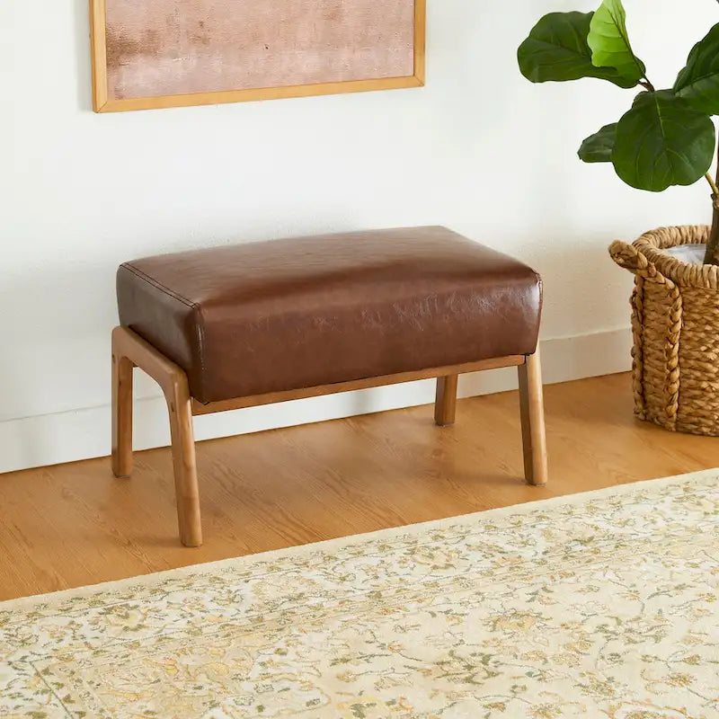 Sgabello decorativo in similpelle con gambe in legno di gomma color noce